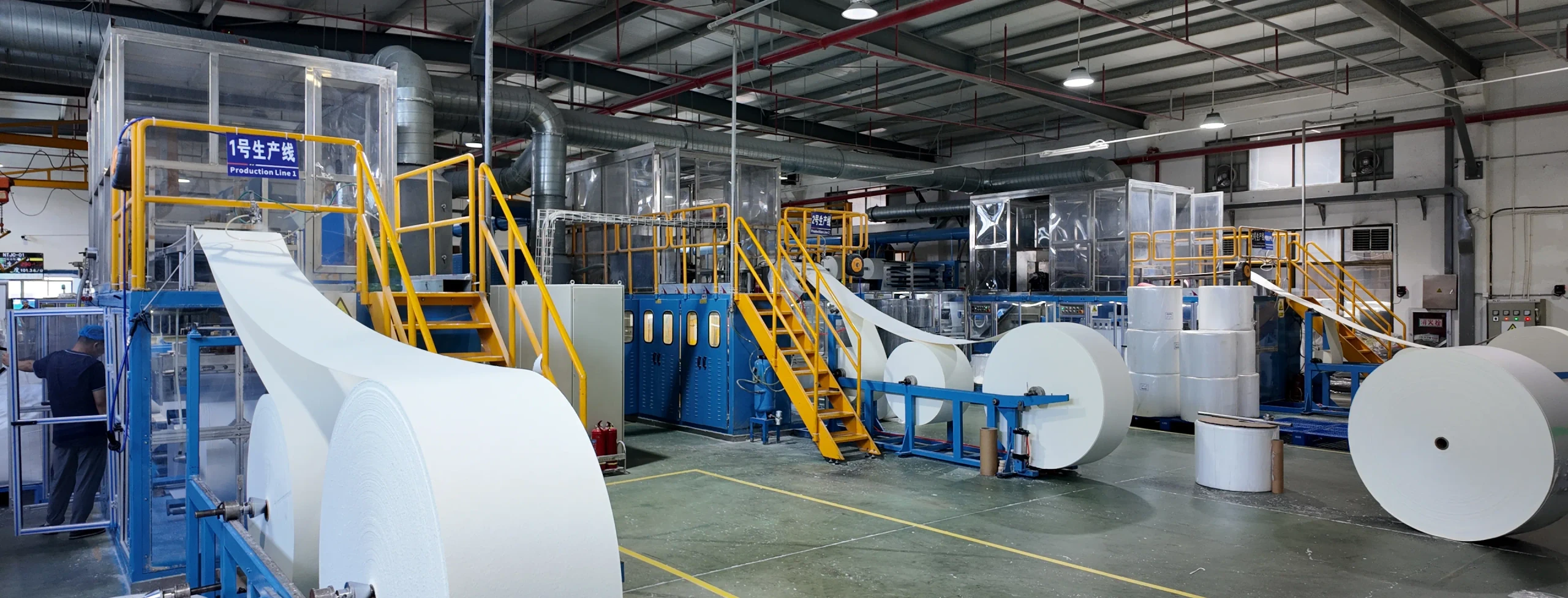 JCZCARE factory production lines and material rolls in Nantong, China